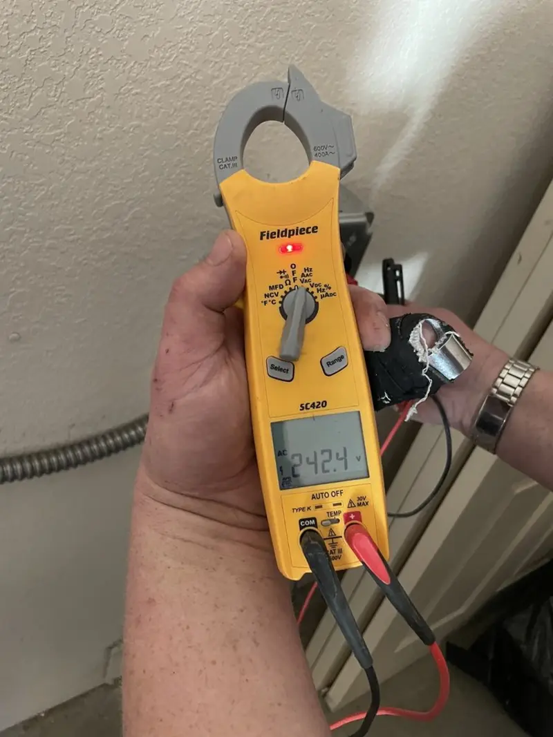 Voltage testing with clamp meter during Electrical Installation Services in San Jacinto